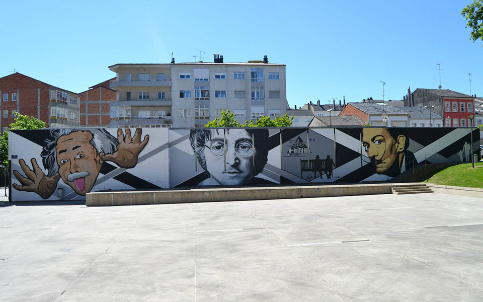 Mural en el que vemos a Enstein, Lennon y Dalí
